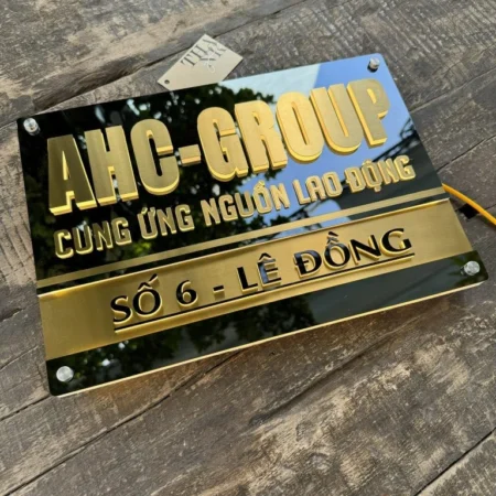 BẢNG, BIỂN TÊN CÔNG TY. Có đèn LED – Inox 304 Gương đen + Xước vàng, Số nổi 10mm. Cao cấp. BSN-PMV260.12