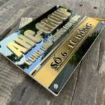 BẢNG, BIỂN TÊN CÔNG TY. Có đèn LED – Inox 304 Gương đen + Xước vàng, Số nổi 10mm. Cao cấp. BSN-PMV260.12